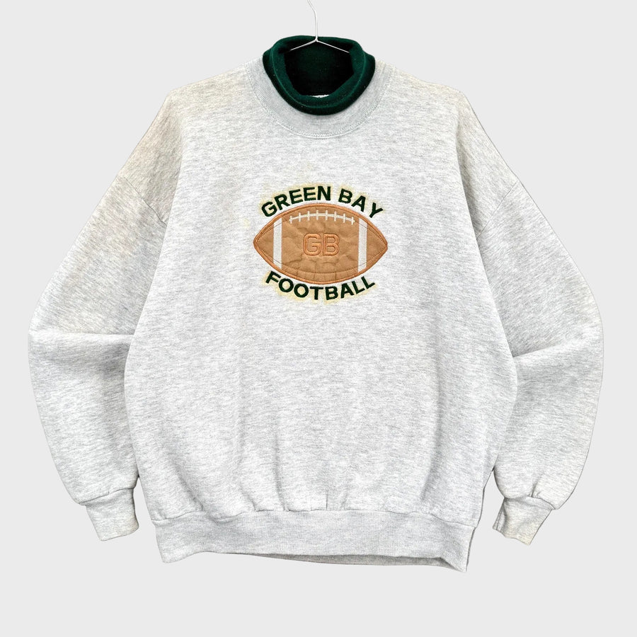 Gray sweatshirt with Green Bay Football logo on a gray background