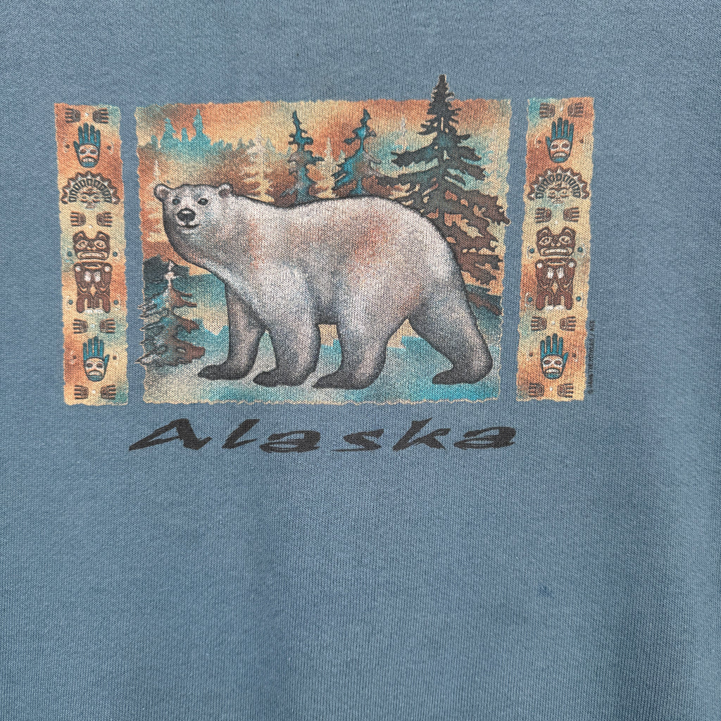 T-shirt with a bear graphic and 'Alaska' text on a blue background