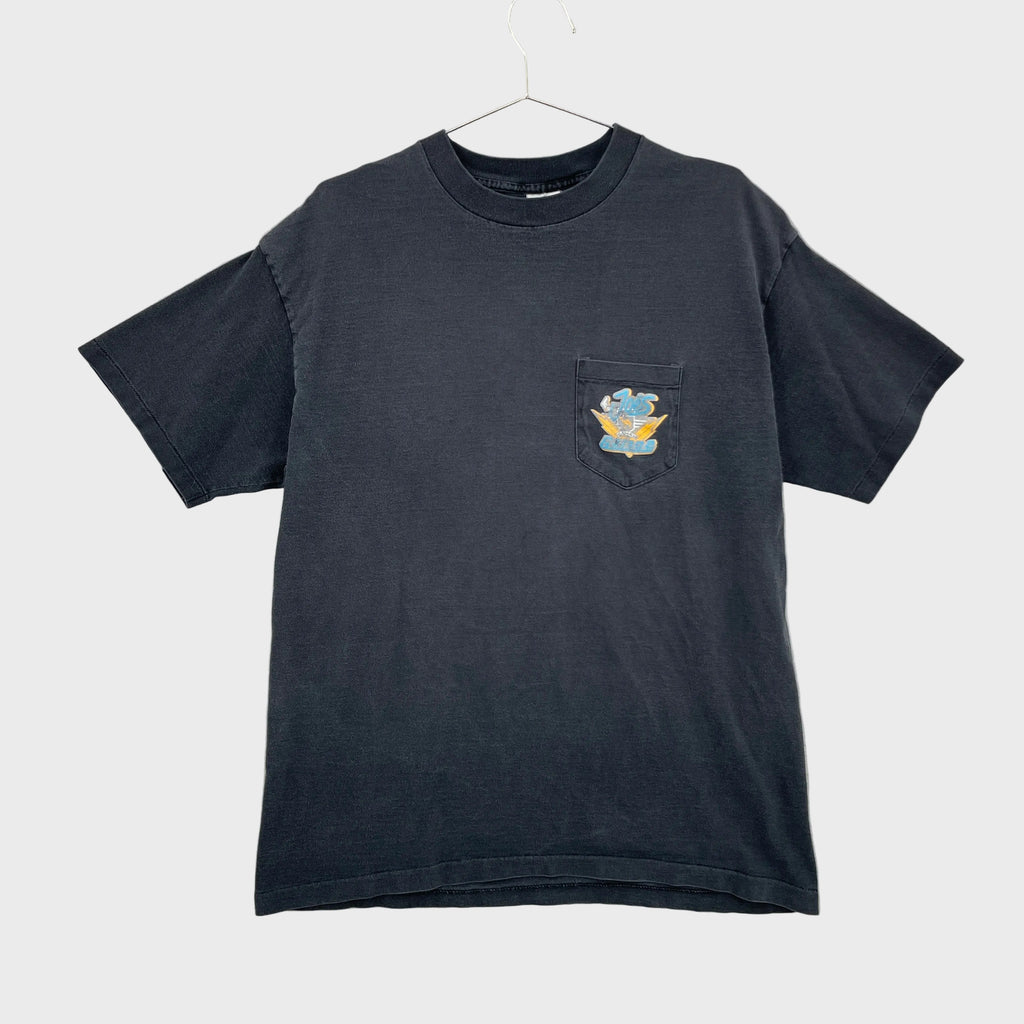 Faded black t-shirt with a colorful logo on a front pocket displayed on a gray background