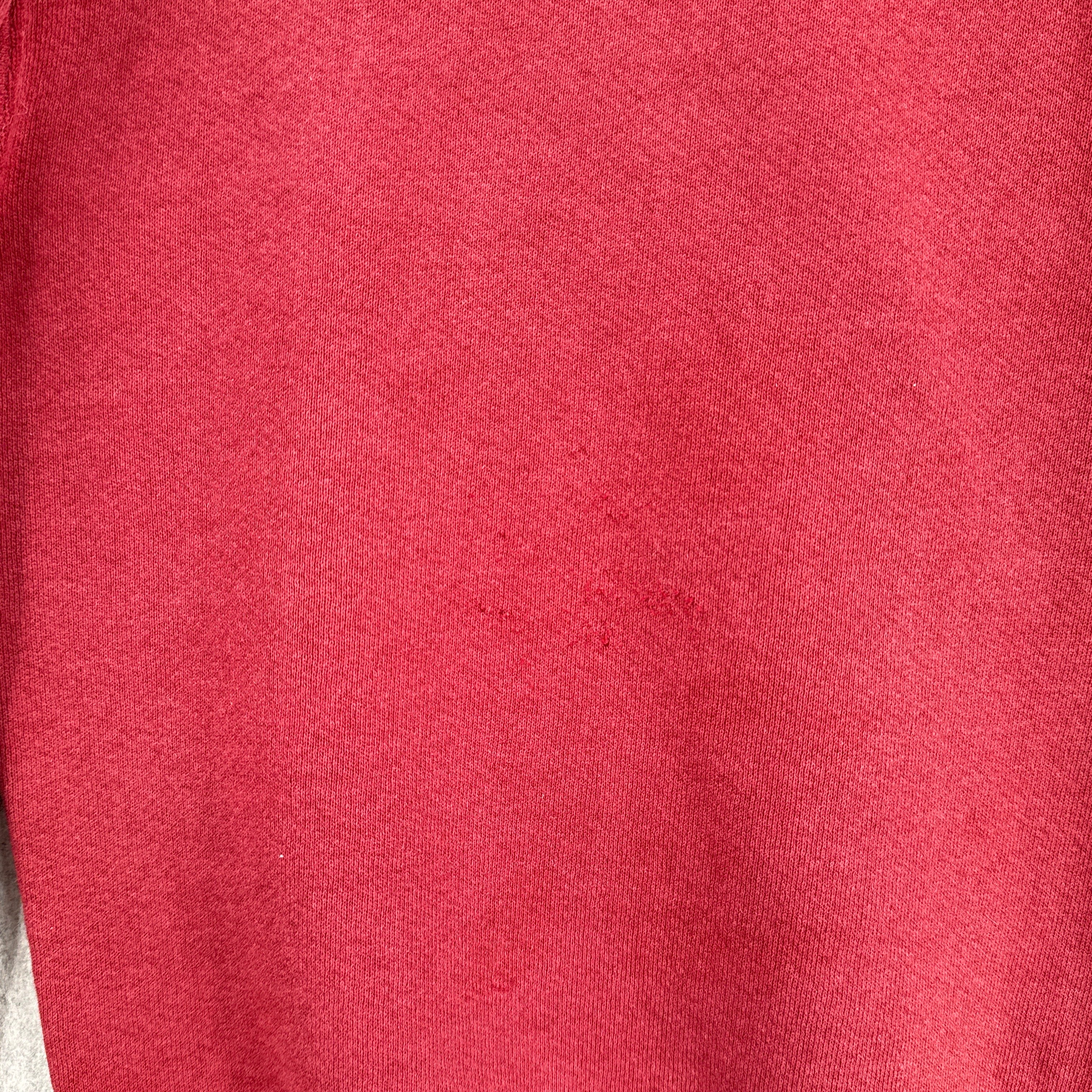 close up of back showing scratch marks in the fabric