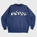 Navy blue sweatshirt with white sailboat pattern on a neutral background