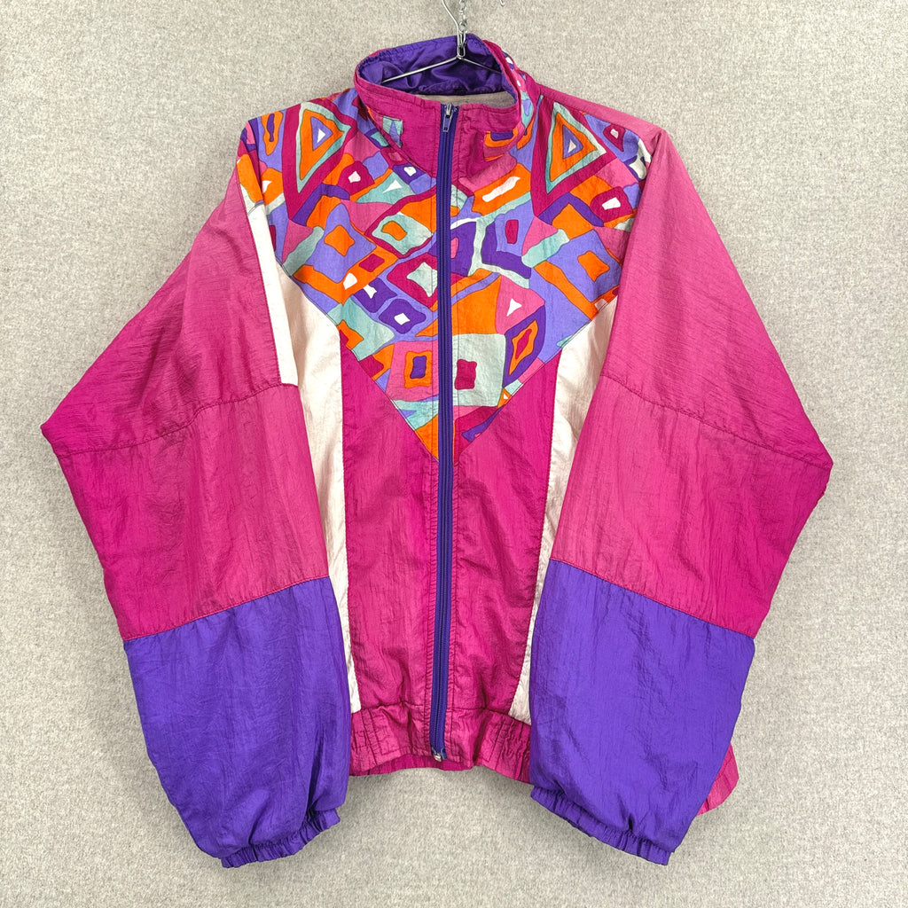 Colorful jacket with geometric pattern on a beige background