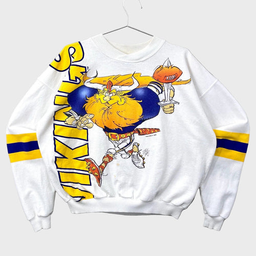 White sweatshirt with a colorful graphic design on a gray background