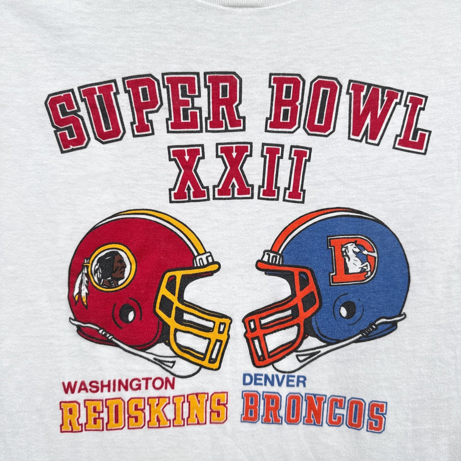 Super Bowl XXII logo featuring Washington and Denver Broncos helmets on a white background