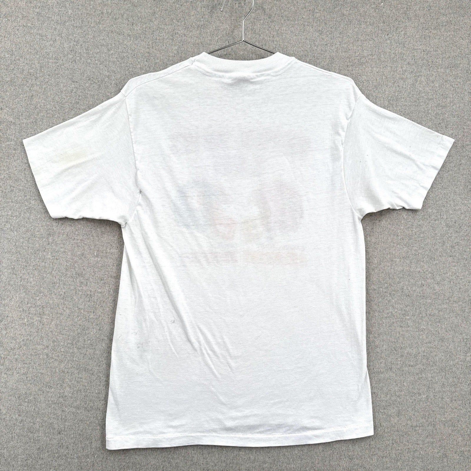 White t-shirt on a gray background