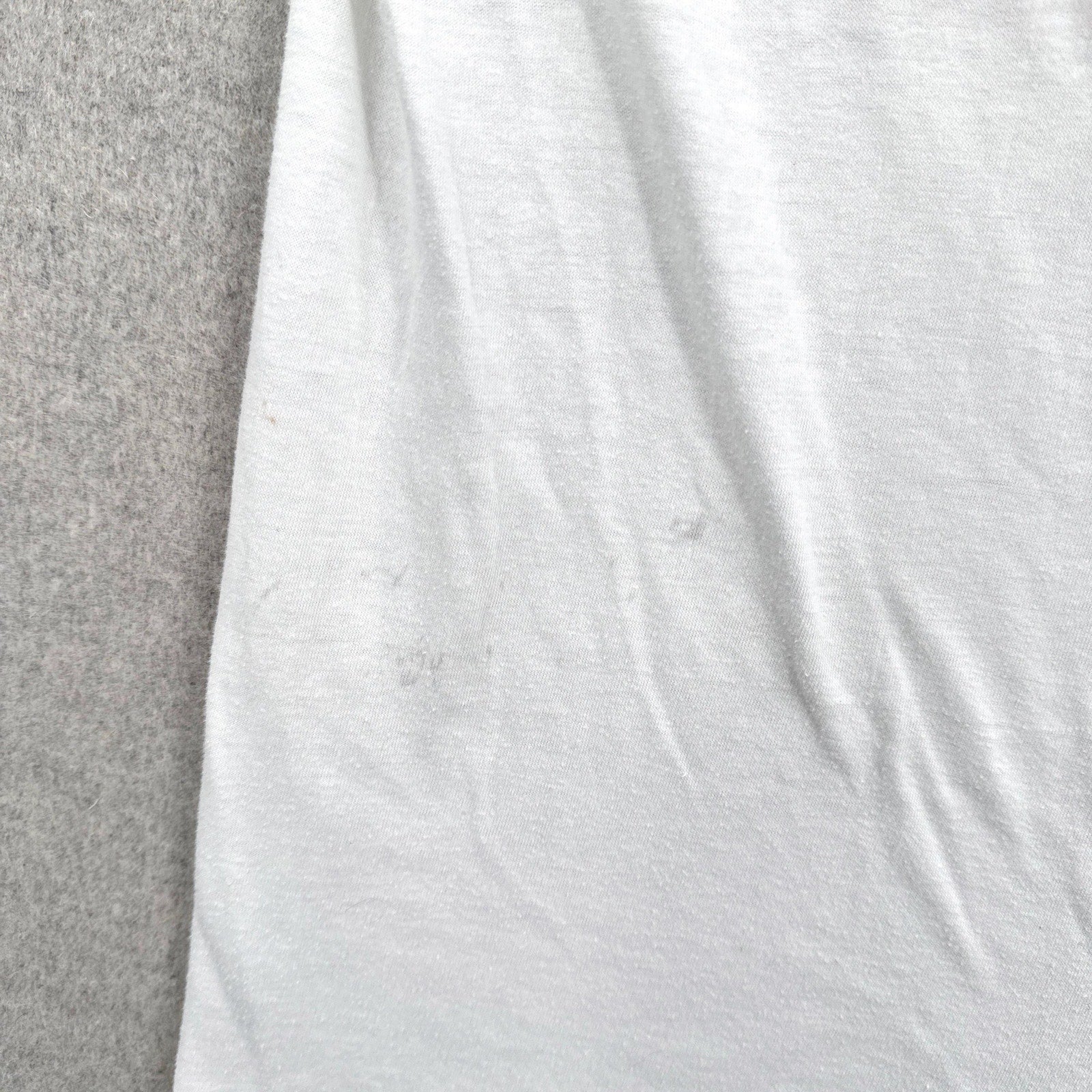 dark spots on back of shirt