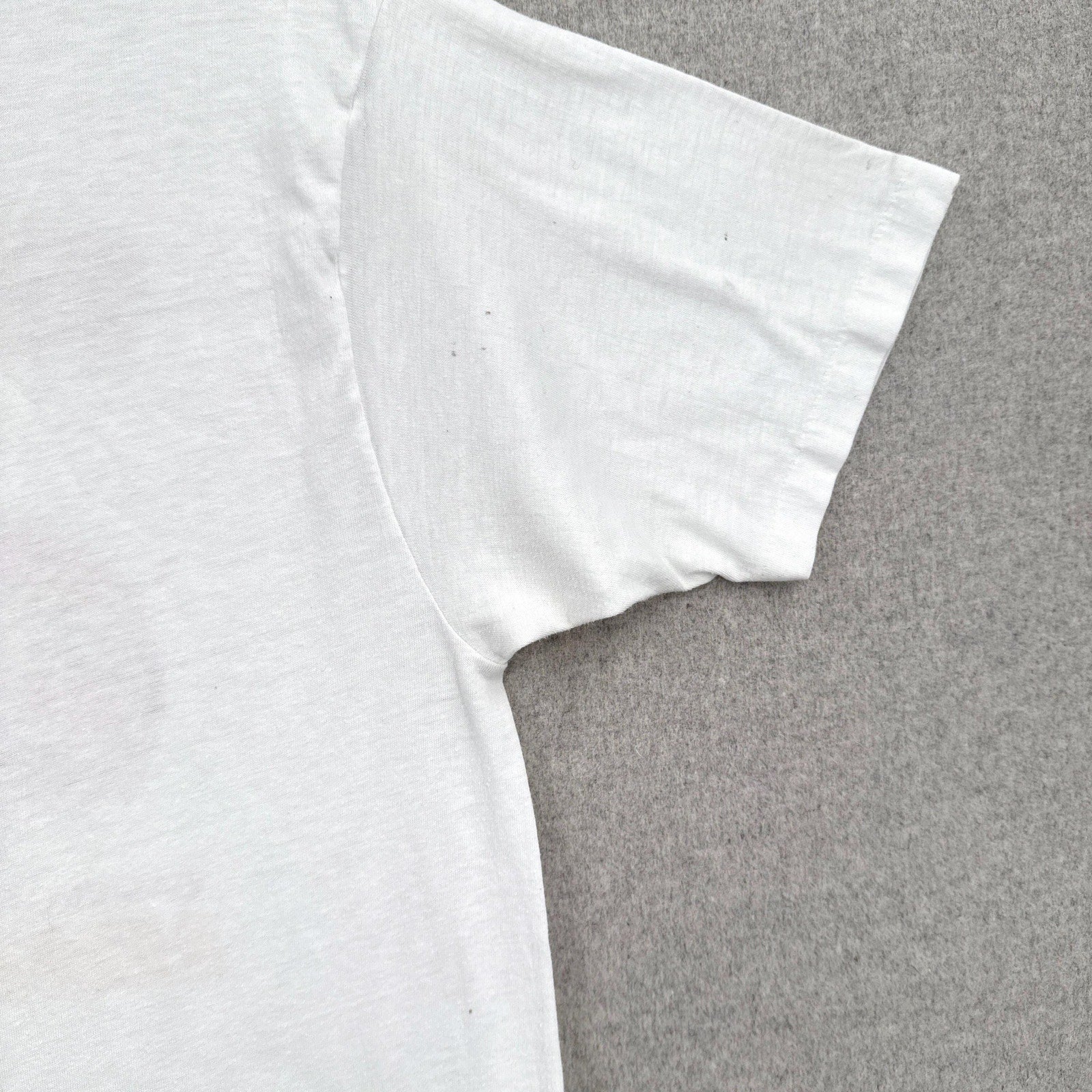 stain spots on back sleeve