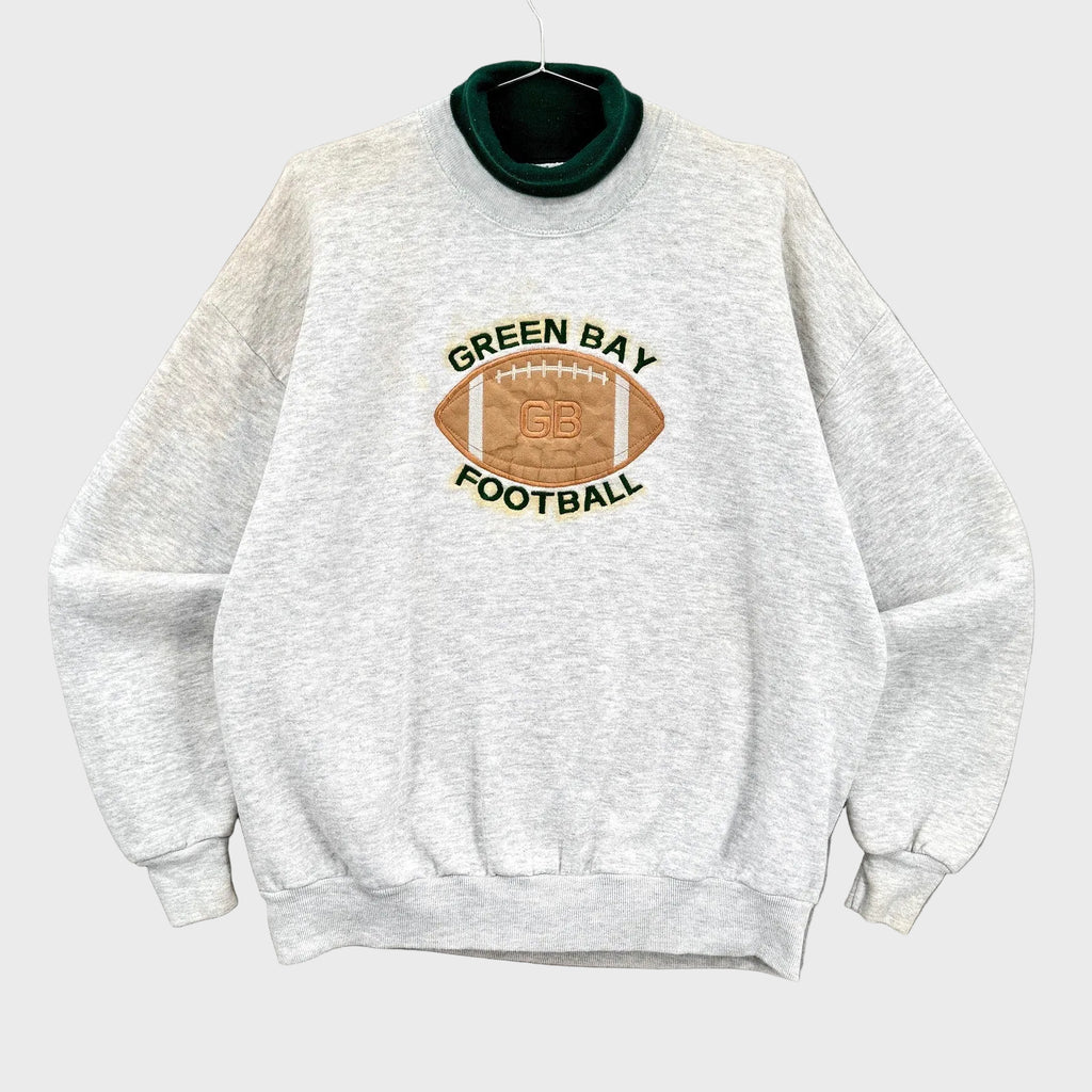 Gray sweatshirt with Green Bay Football logo on a gray background