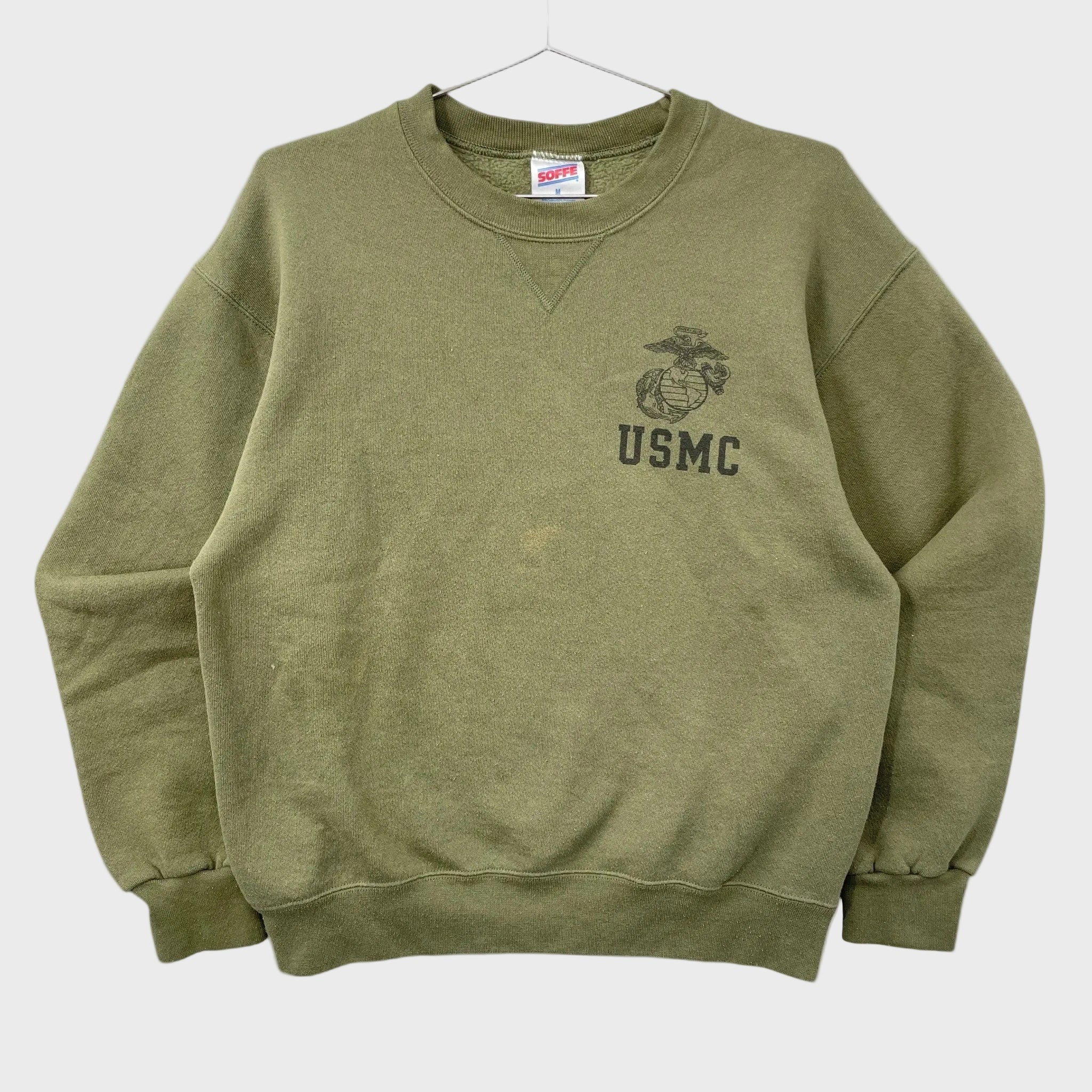 Vintage Faded Green USMC crewneck sweatshirt from the 1990s on a white background