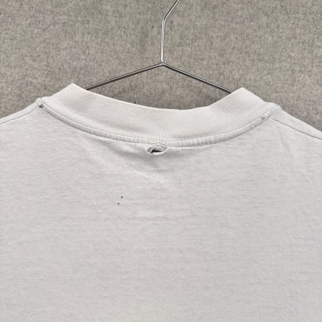 holes in the back around collar