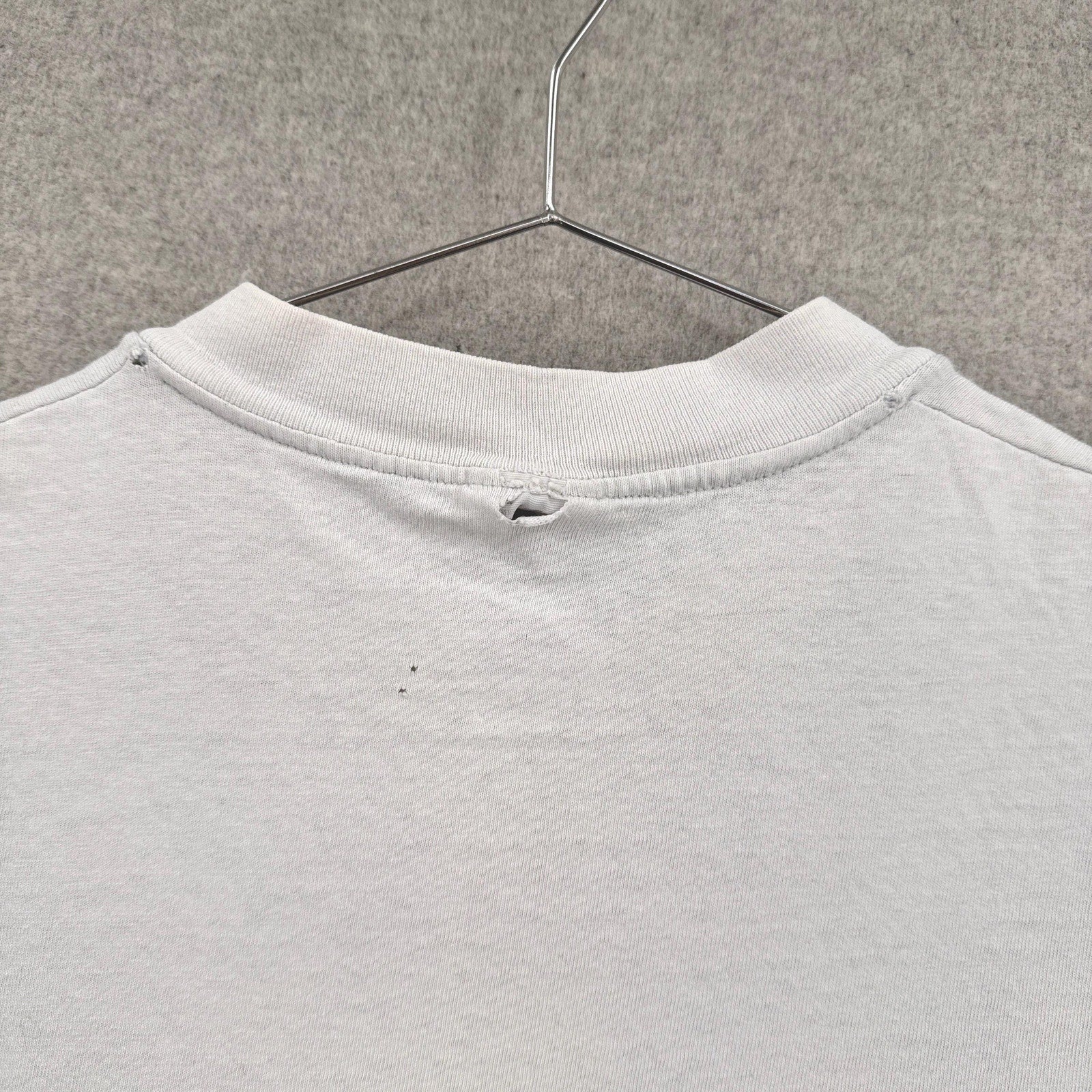 holes in the back around collar
