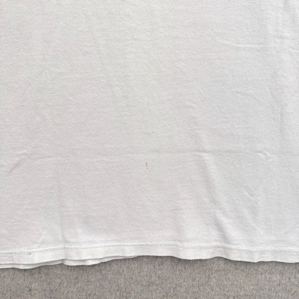 stain spots on the back of the shirt, small