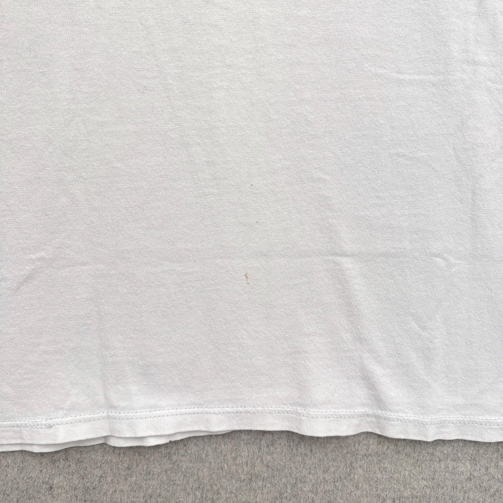stain spots on the back of the shirt, small