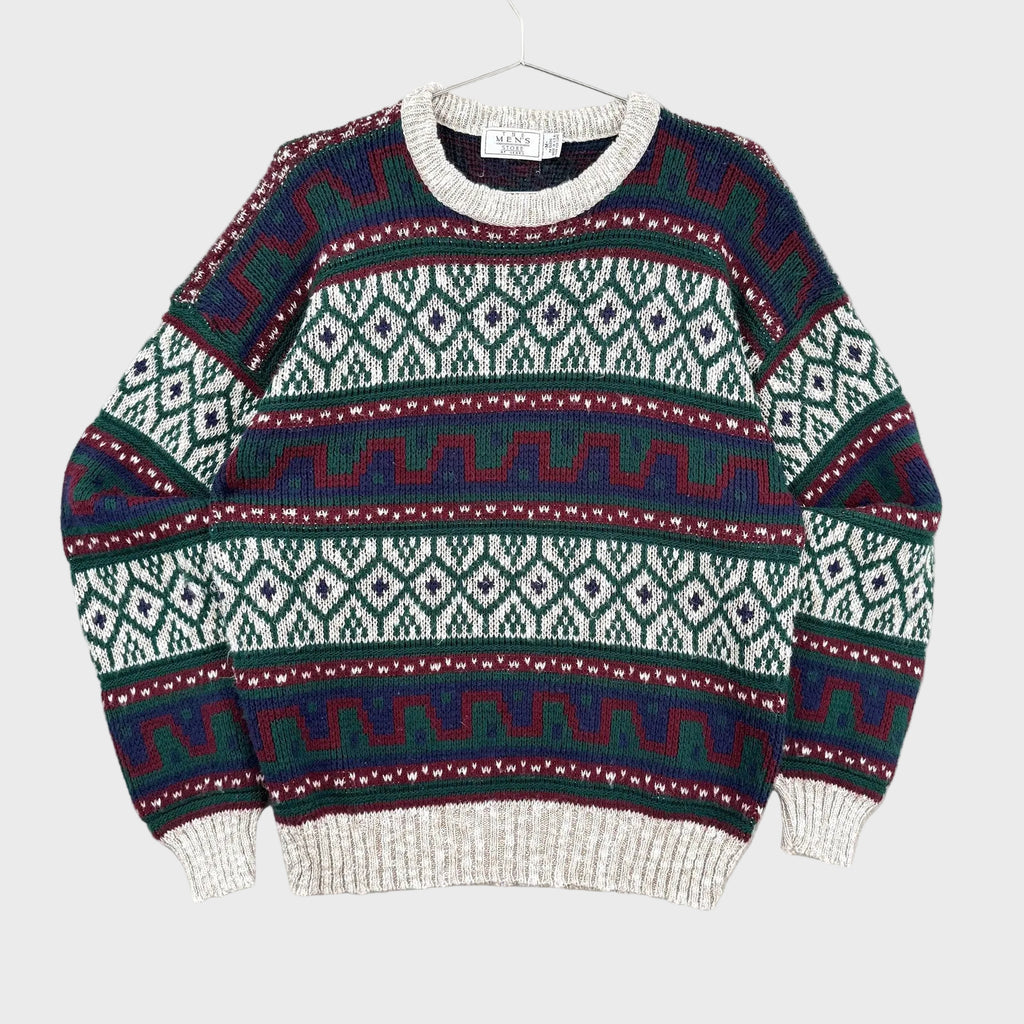 Knitted sweater with a pattern on a gray background