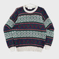 Knitted sweater with a pattern on a gray background