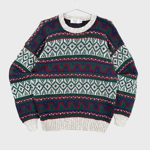 Knitted sweater with a pattern on a gray background
