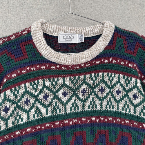 Colorful patterned sweater on a hanger with a visible brand label.