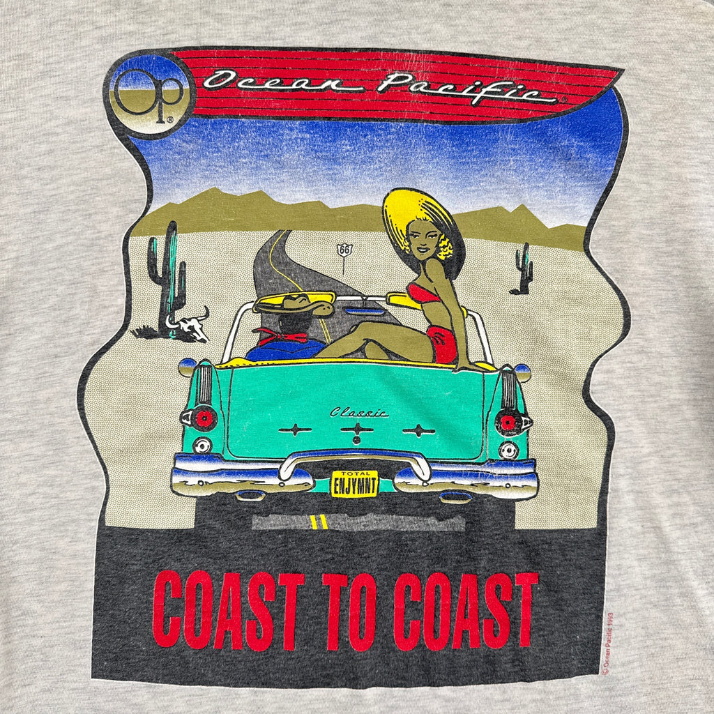 T-shirt with a graphic of a car and people in a desert, 'Coast to Coast' text, and 'Ocean Pacific' branding.