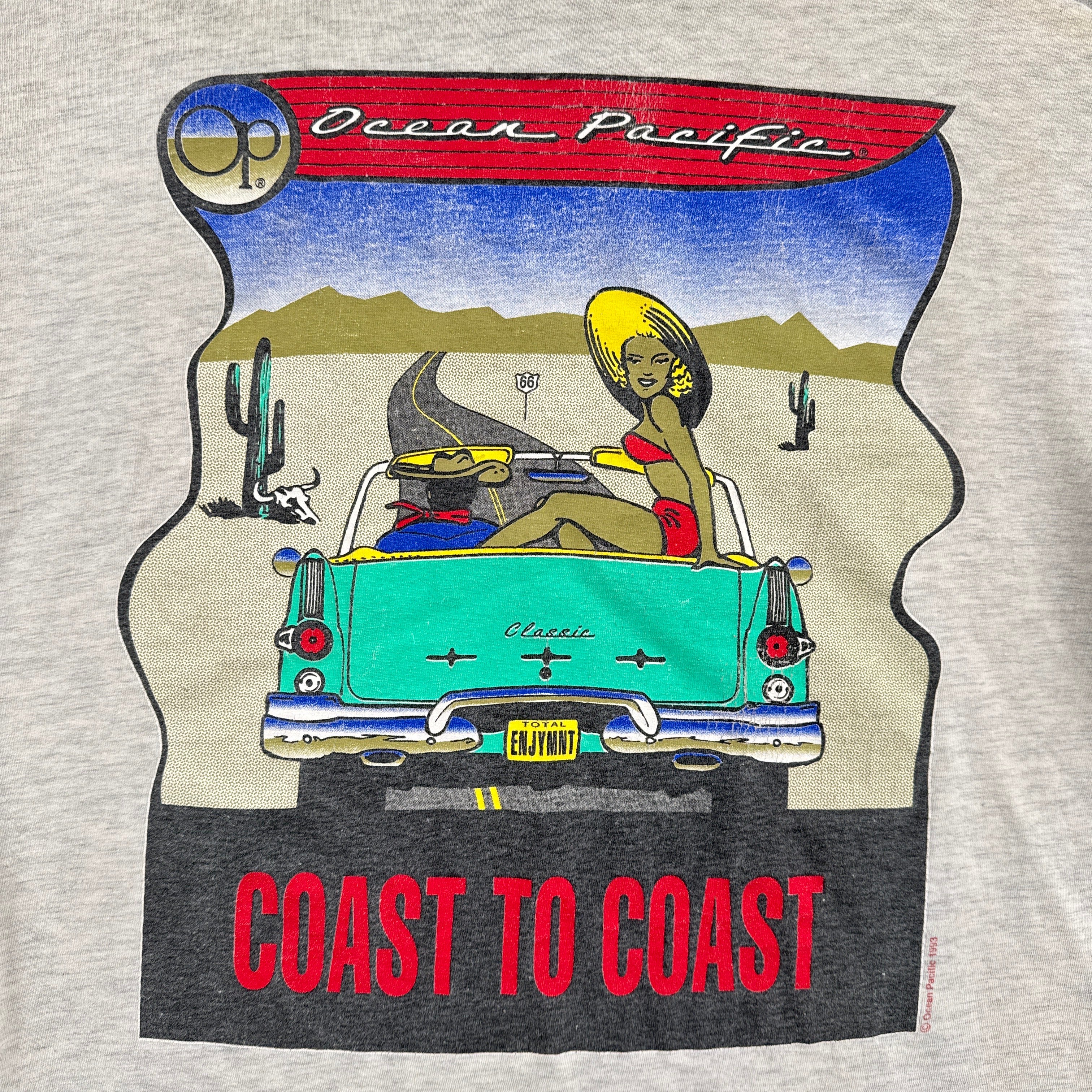 T-shirt with a graphic of a car and people in a desert, 'Coast to Coast' text, and 'Ocean Pacific' branding.