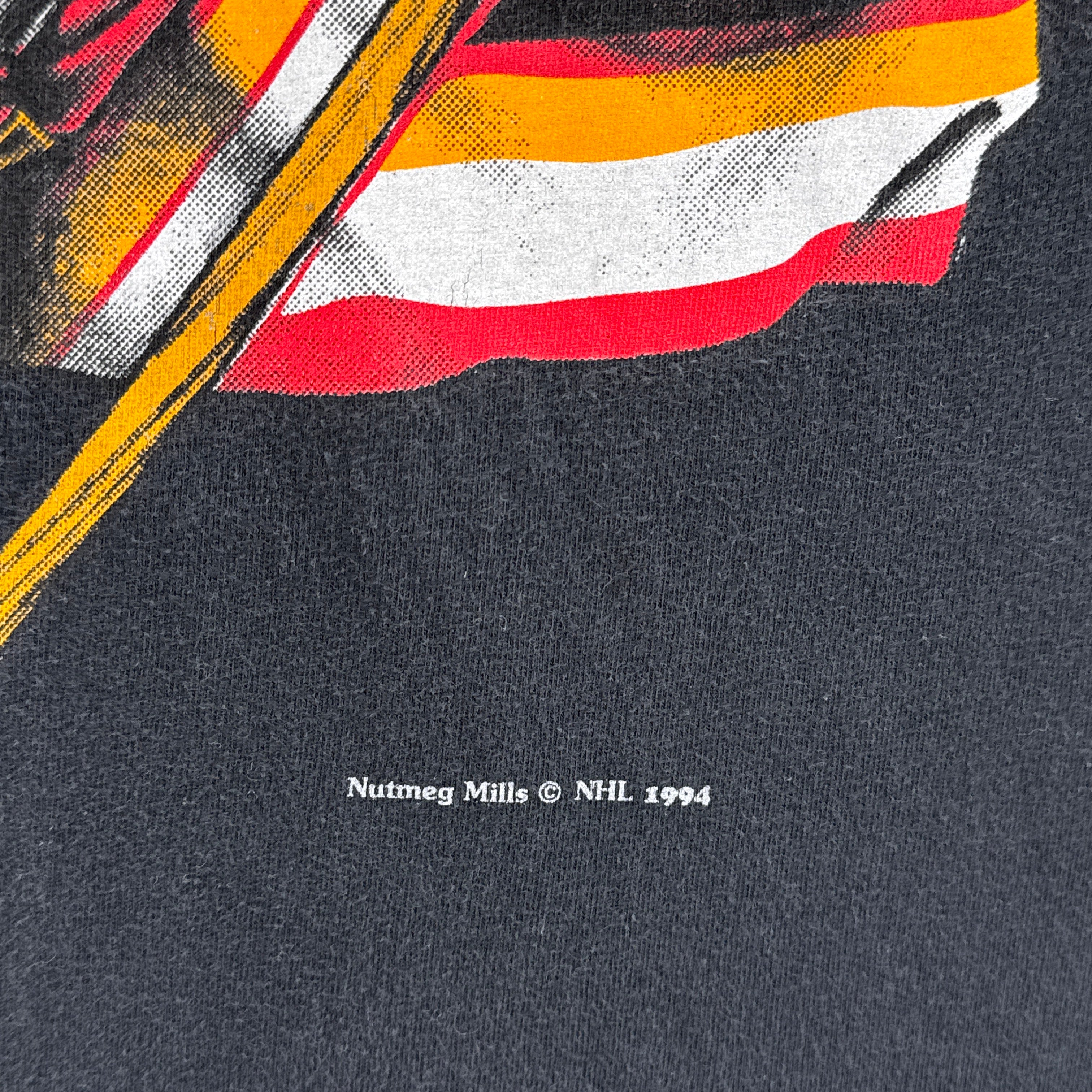Vintage 1994 Calgary Flames NHL Nutmeg Graphic Tee