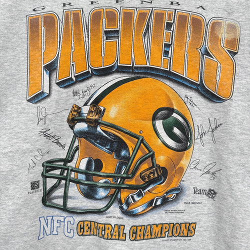 Green Bay Packers t-shirt with helmet graphic and text on a gray background