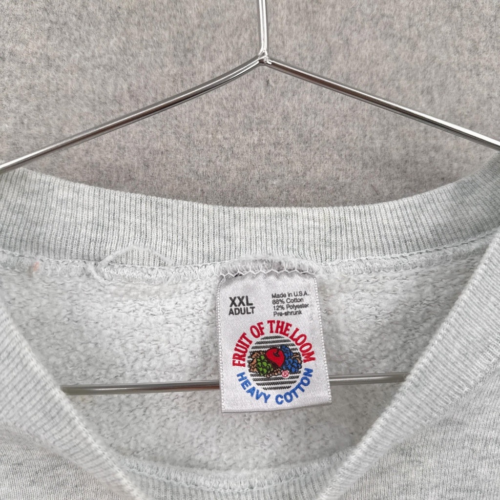 Gray sweatshirt with a 'Fruit of the Loom' label on a hanger. size 2XL 