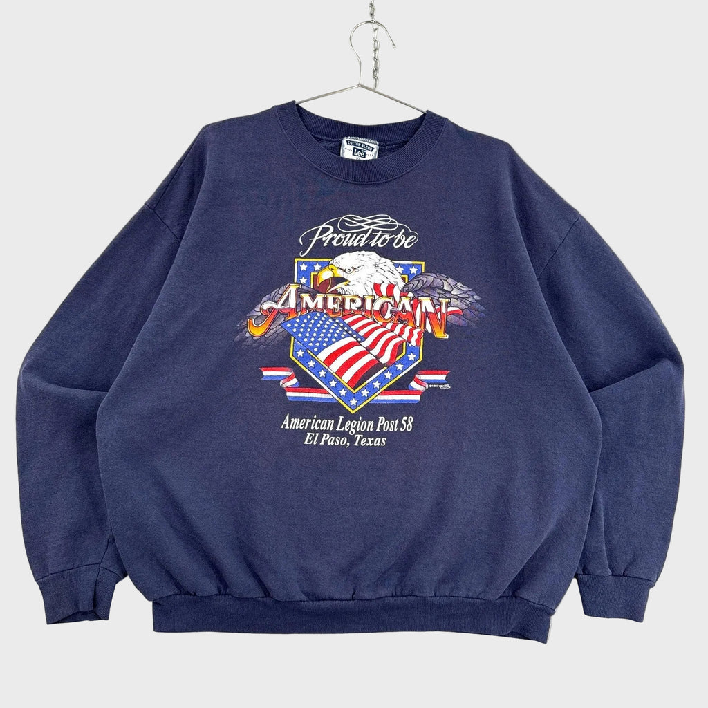 Navy blue sweatshirt with American Legion Post 58 design on a textured gray background with a bald eagle and american flag