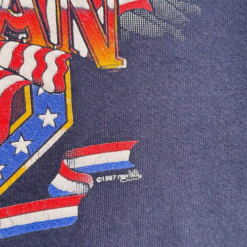 close up of 1997 date stamp on design