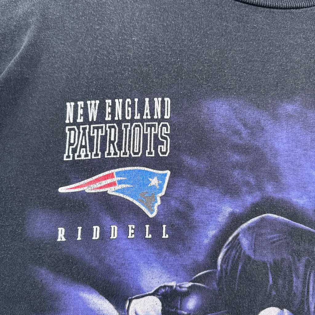 New England Patriots Riddell logo on a dark background