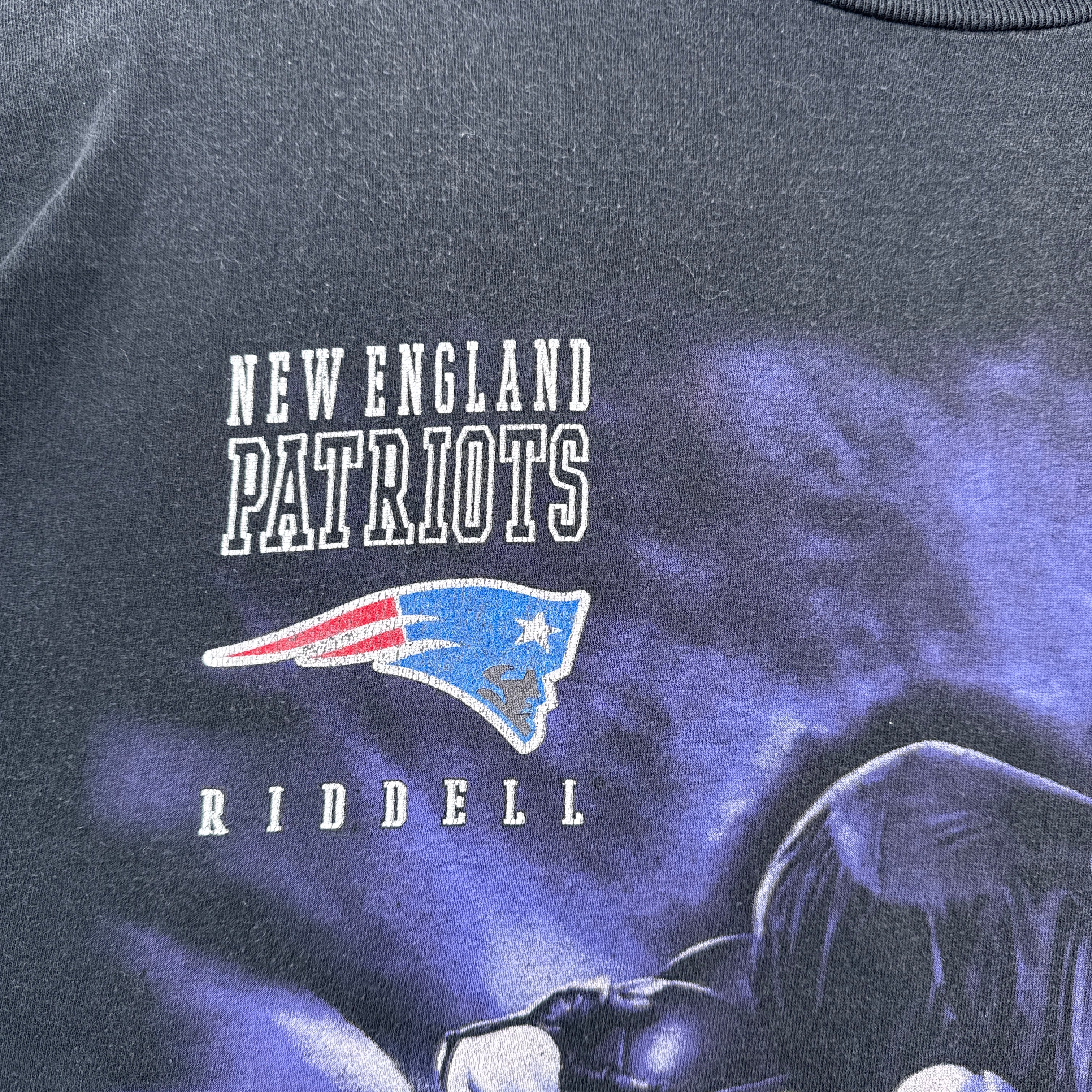 New England Patriots Riddell logo on a dark background