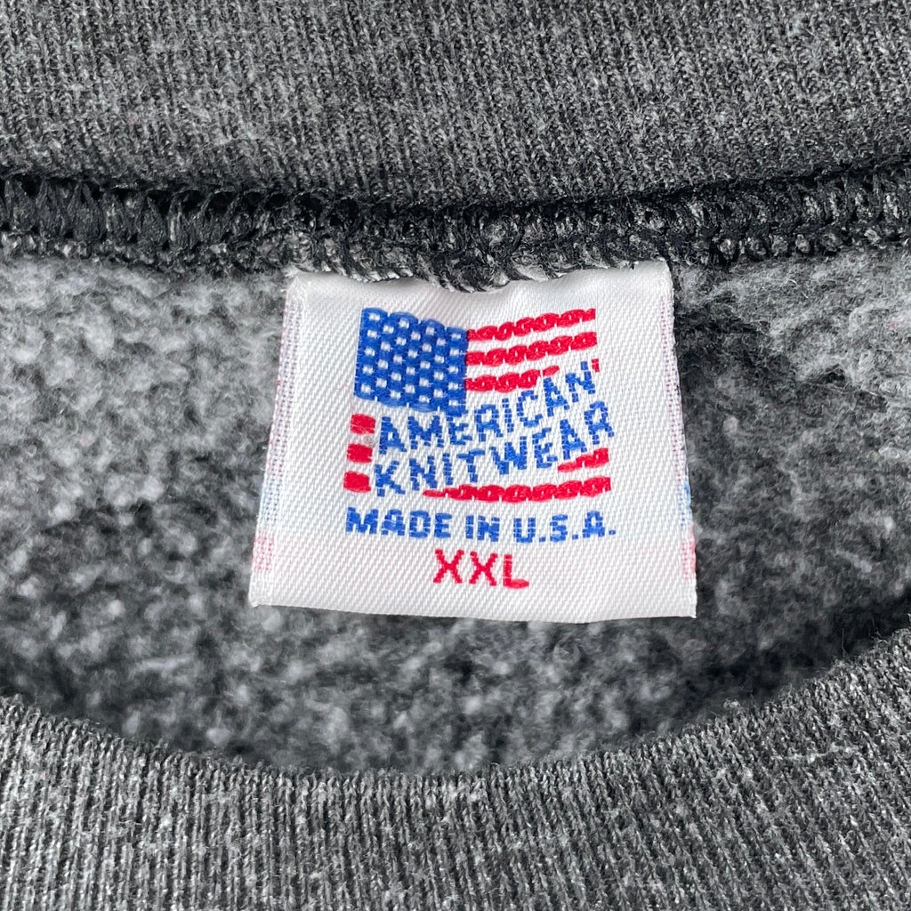 Gray knitwear with an 'American Knitwear Made in U.S.A. XXL' label.