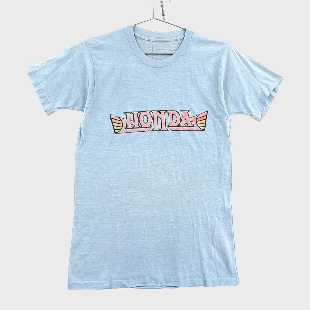 Light blue t-shirt with Honda logo on a gray background