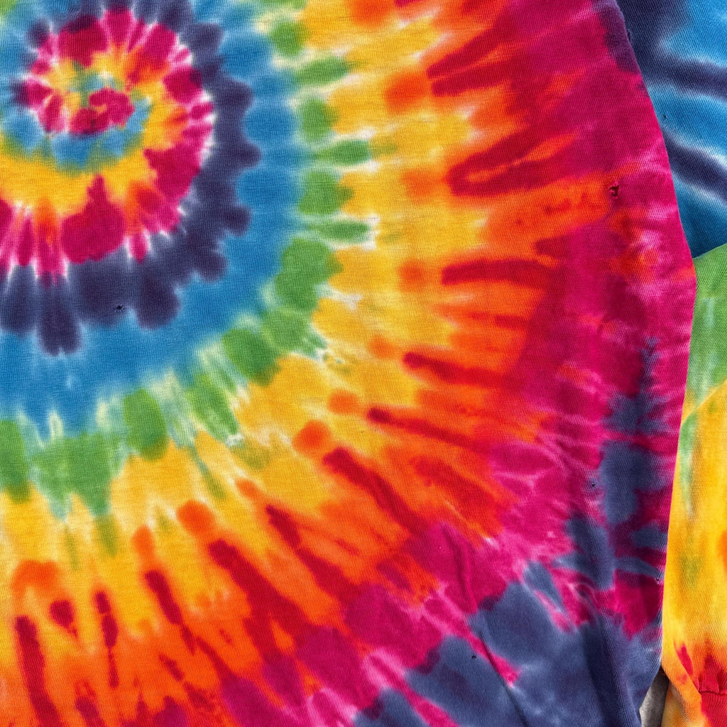 Close-up of a tie-dye pattern with vibrant colors.