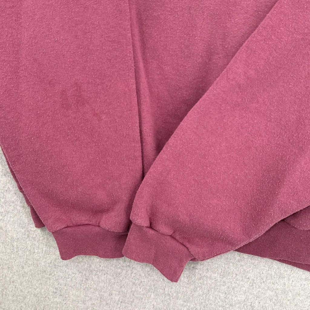 close up of sleeves of sweatshirt with darkened discolouration spots