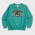 Teal sweatshirt with 'Branson, Missouri' graphic on a gray background