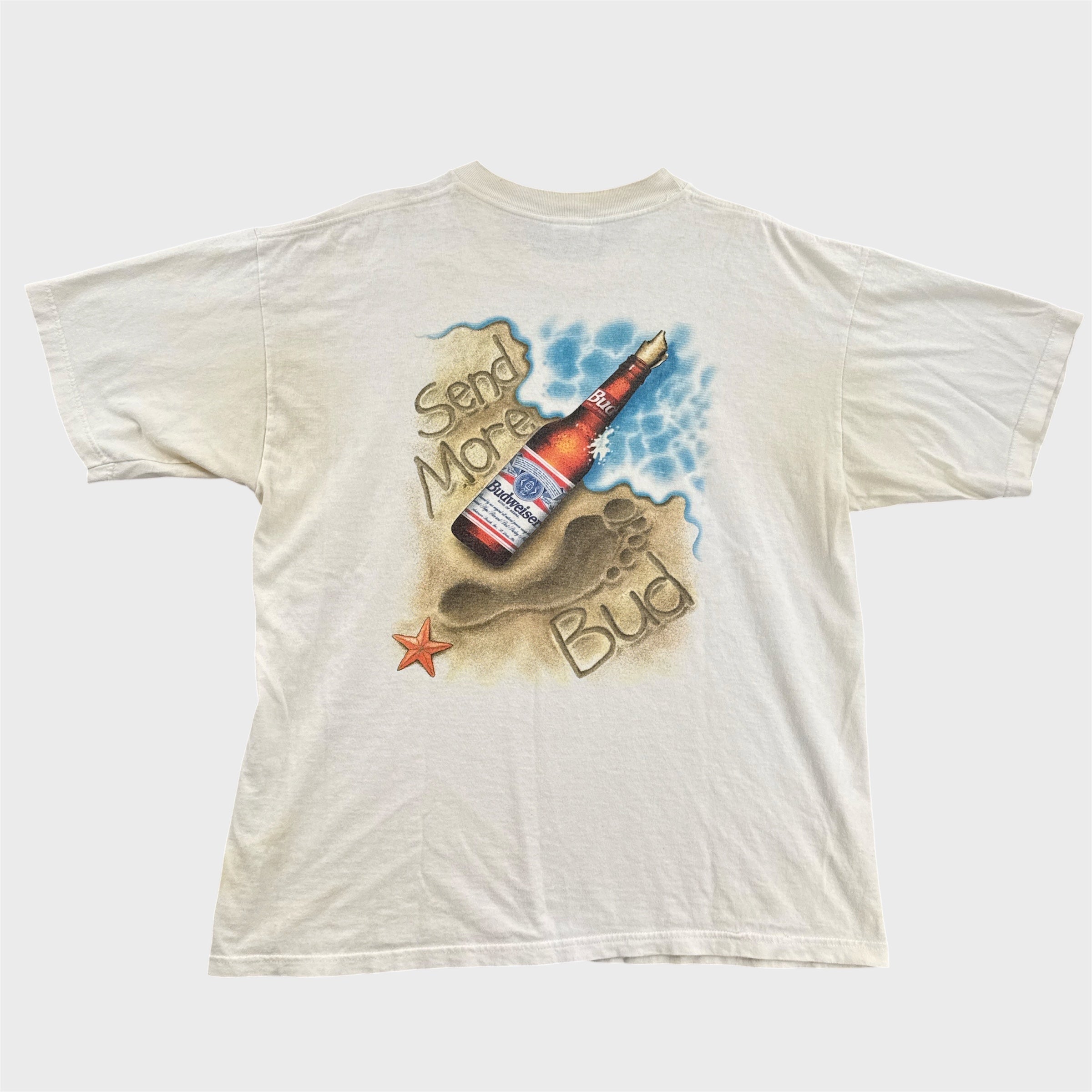 White t-shirt with a graphic of a budweiser bottle and text on a white background