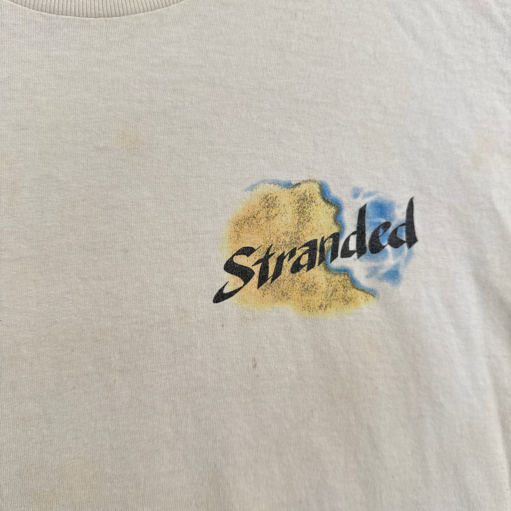 Logo with 'Stranded' text on a textured beige background