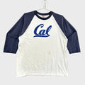 White and navy baseball shirt with 'Cal' logo on a gray background