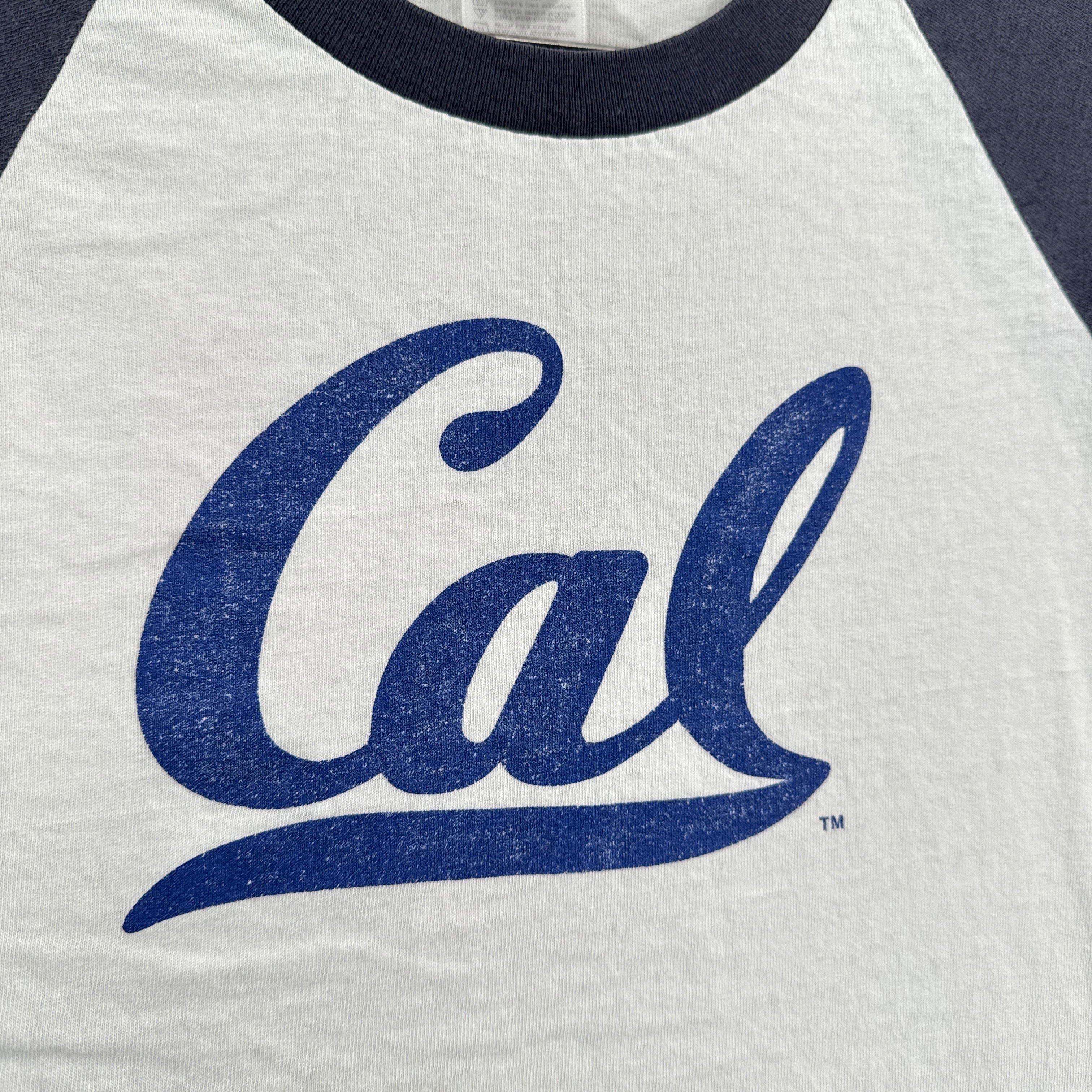 Gray baseball shirt with blue 'Cal' logo on a white background