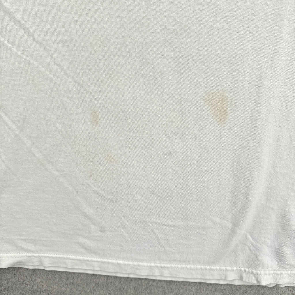 White fabric with stains on a gray background