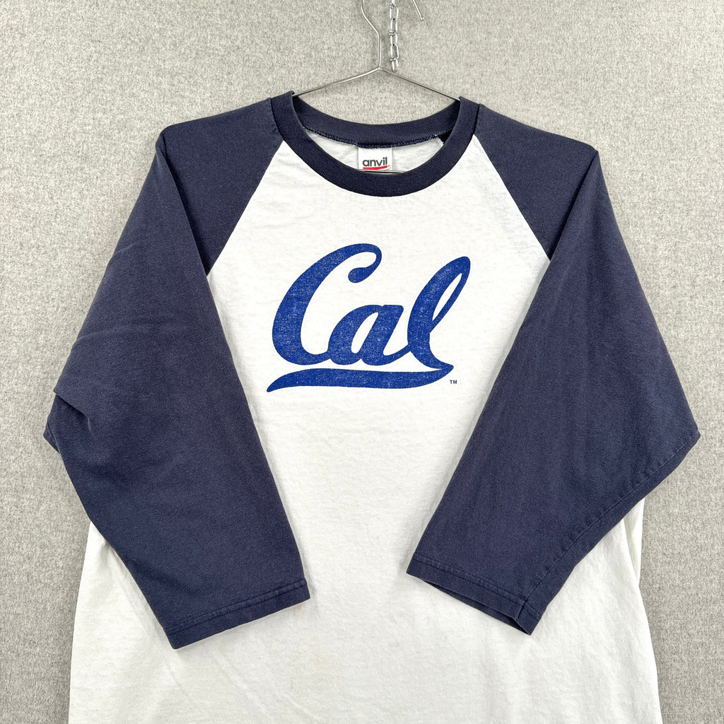 Navy and white baseball shirt with 'Cal' logo on a hanger against a neutral background