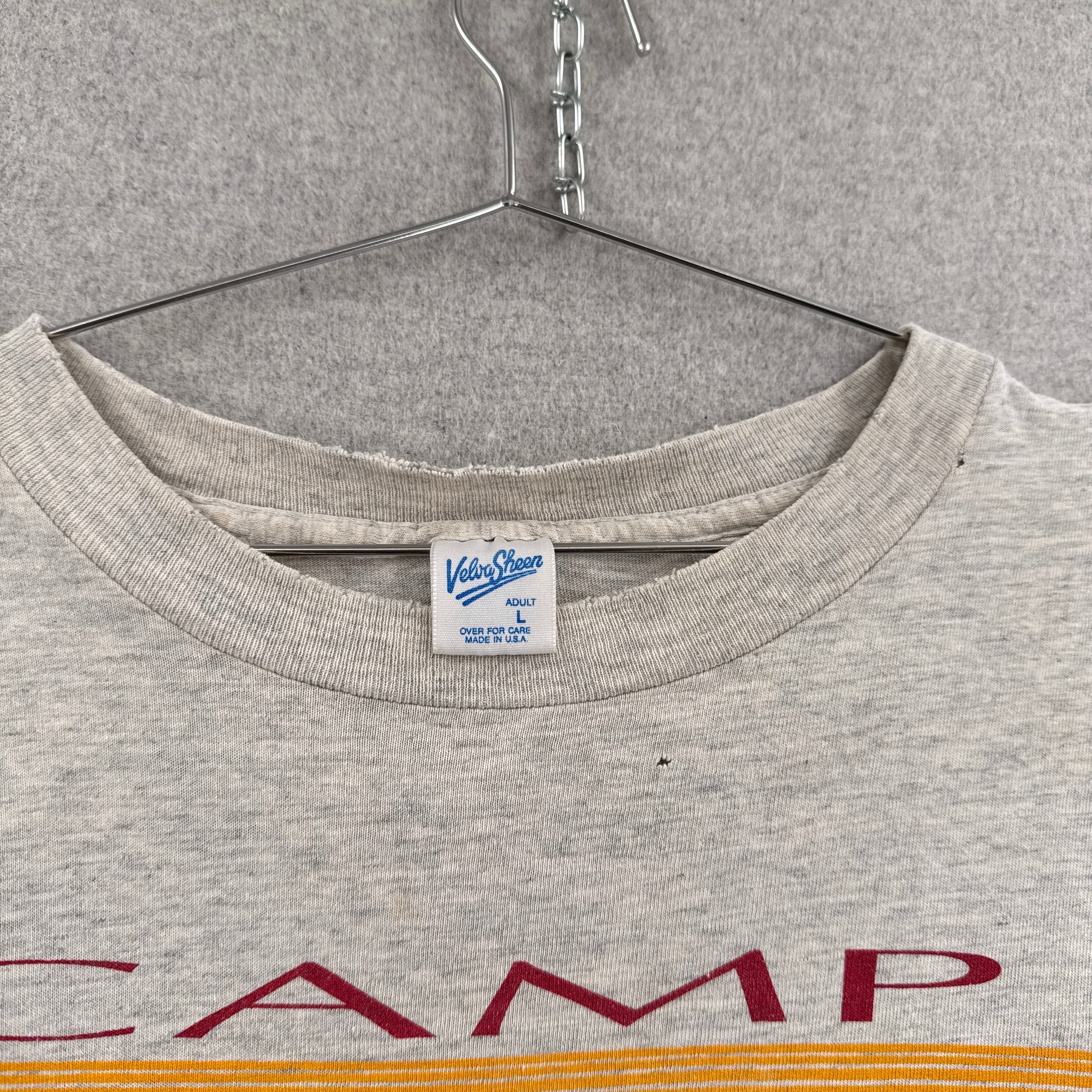 Gray t-shirt with a visible brand label on a hanger. Tag gsize large