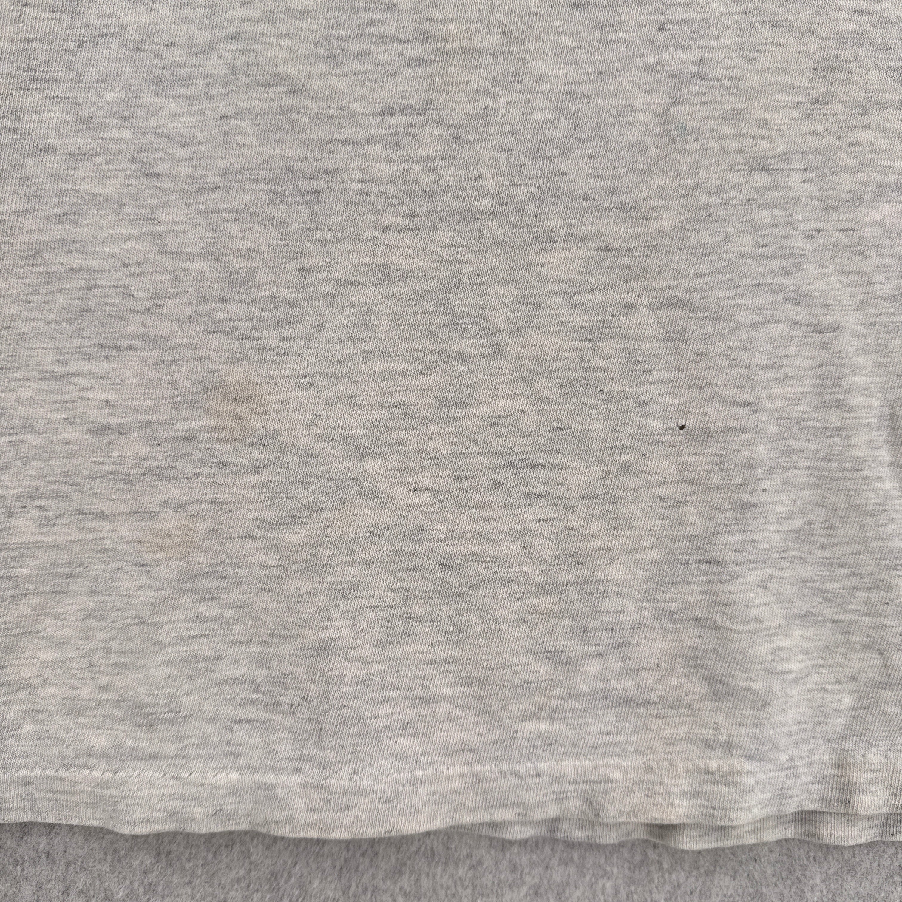 close up of stain spots and small hole