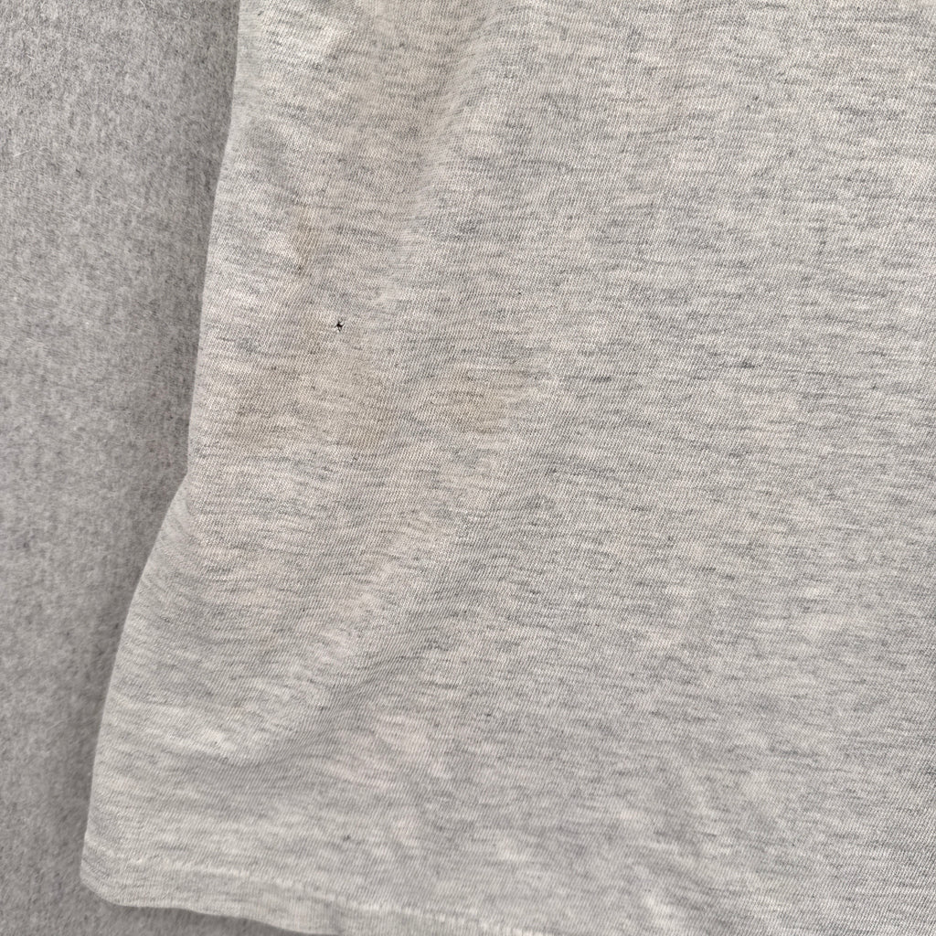 close up of stain spot and small hole