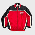 Red and black jacket with 'Chicago Bulls' logo on a gray background