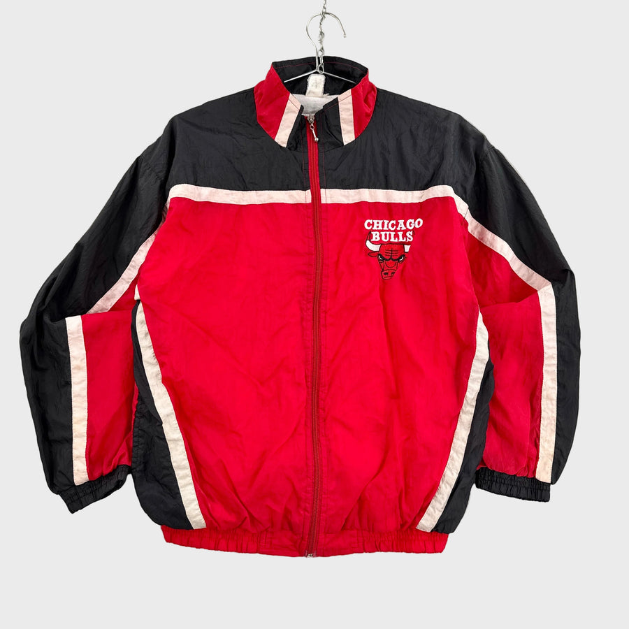 Red and black jacket with 'Chicago Bulls' logo on a gray background