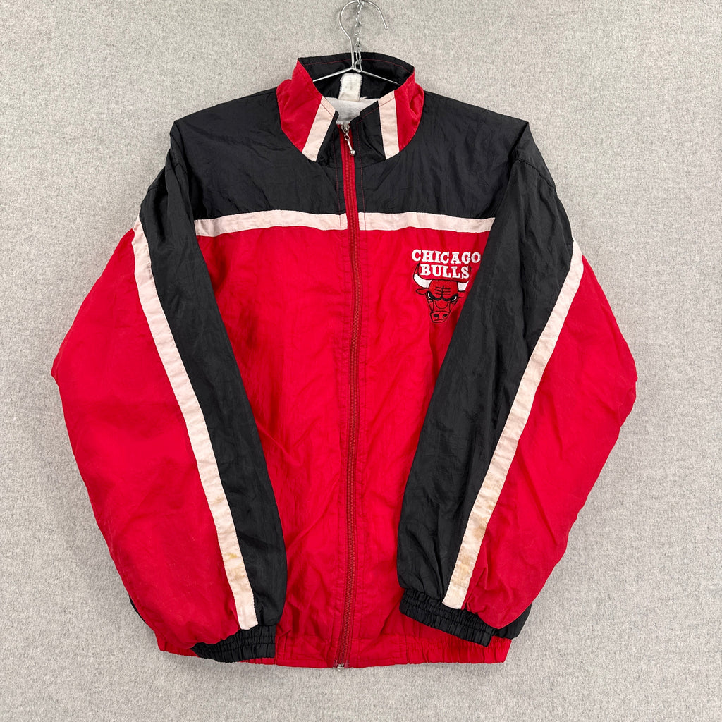 Red and black jacket with Chicago Bulls logo on a gray background