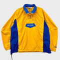Yellow and blue jacket with Columbia logo on a gray background