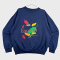 Navy blue sweatshirt with colorful 'England' design on a textured gray background