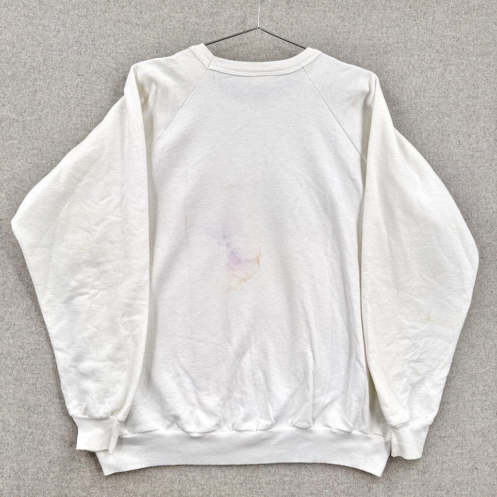 White sweatshirt on a gray background